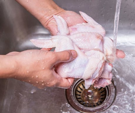 Raw chicken needs to be cooked not washed to kill bacteria